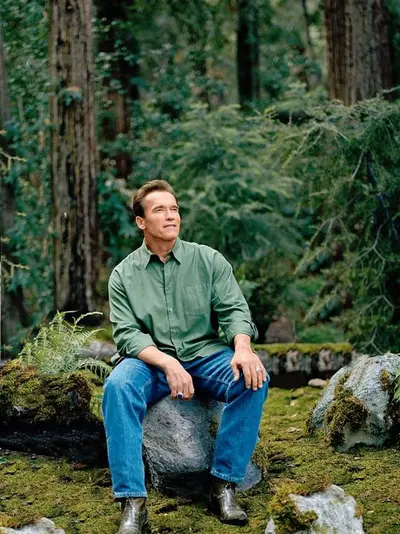 Arnold Schwarzenegger forest sitting meme template