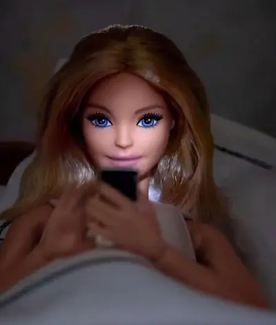 Barbie on phone in bed meme template