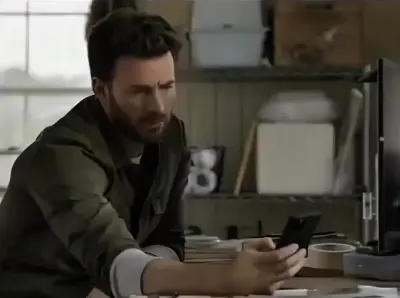 Chris Evans checking his phone meme template
