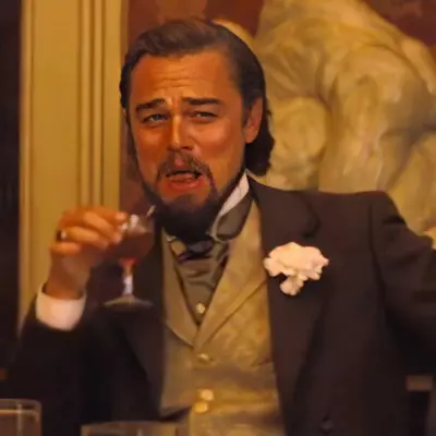 Django laughing with drink meme template
