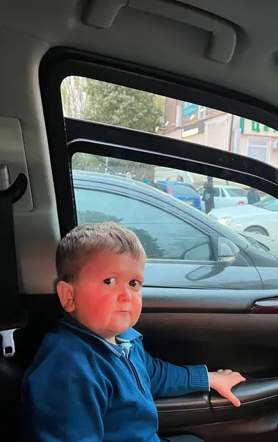 Hasbulla shocked kid car meme template