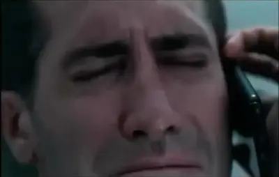 Jake Gyllenhaal crying on the phone meme template