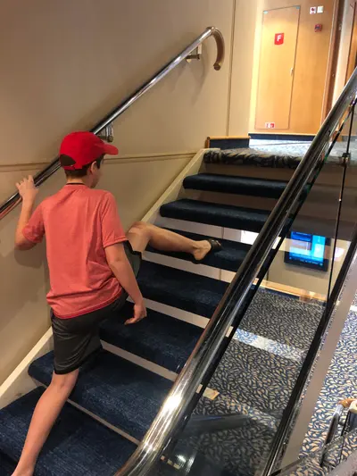 Kid climbing stairs wrong way meme template