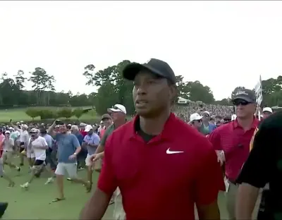 Tiger Woods walking to the green meme template