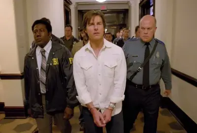 Tom Cruise in handcuffs meme template